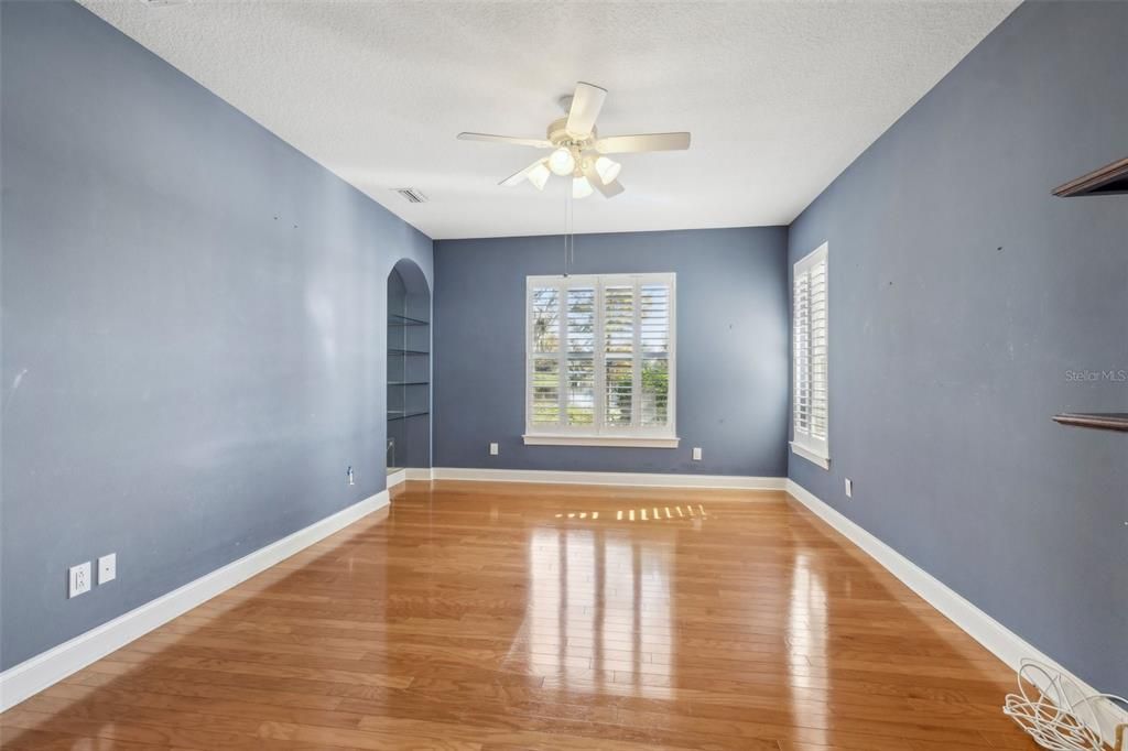 Master BR with view of lake and built-ins