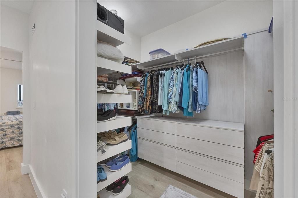 New master custom closet that can be reconfigured to suit preferences