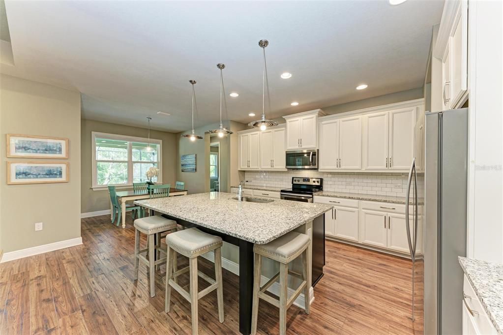 Kitchen with large granite island.