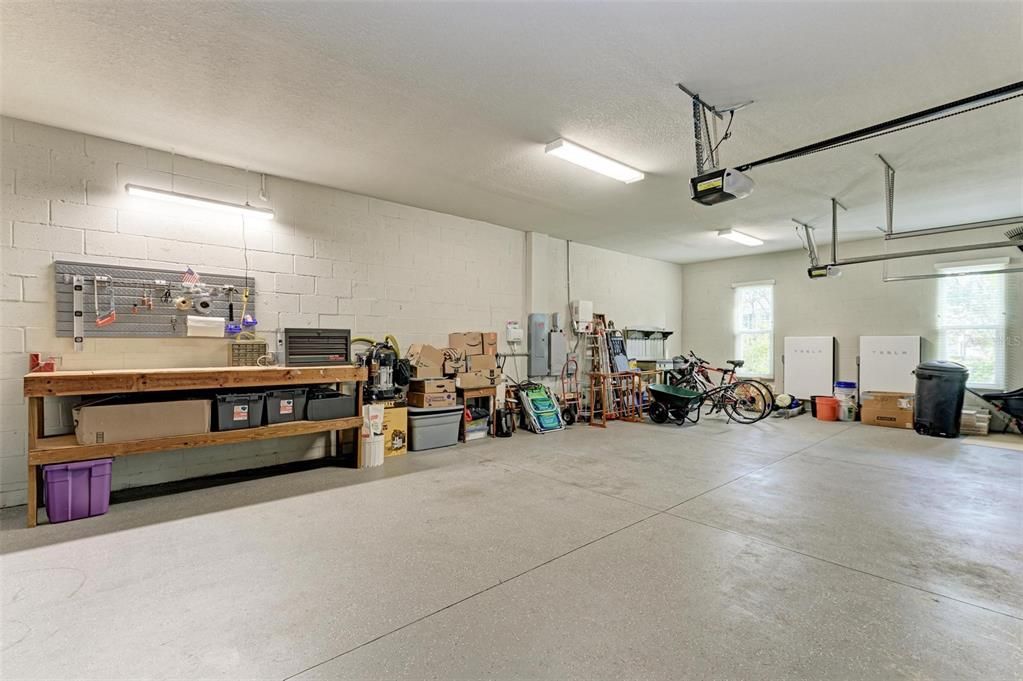 Oversized, 3-car garage with workbench.