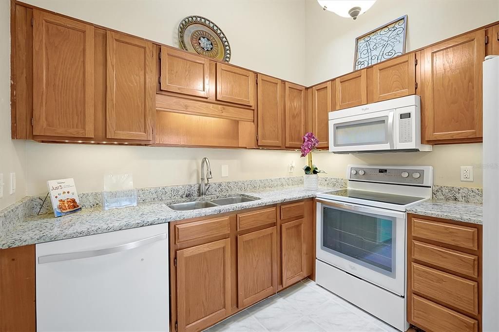 SKylight in kitchen offers plenty of light to the Chef in your family.