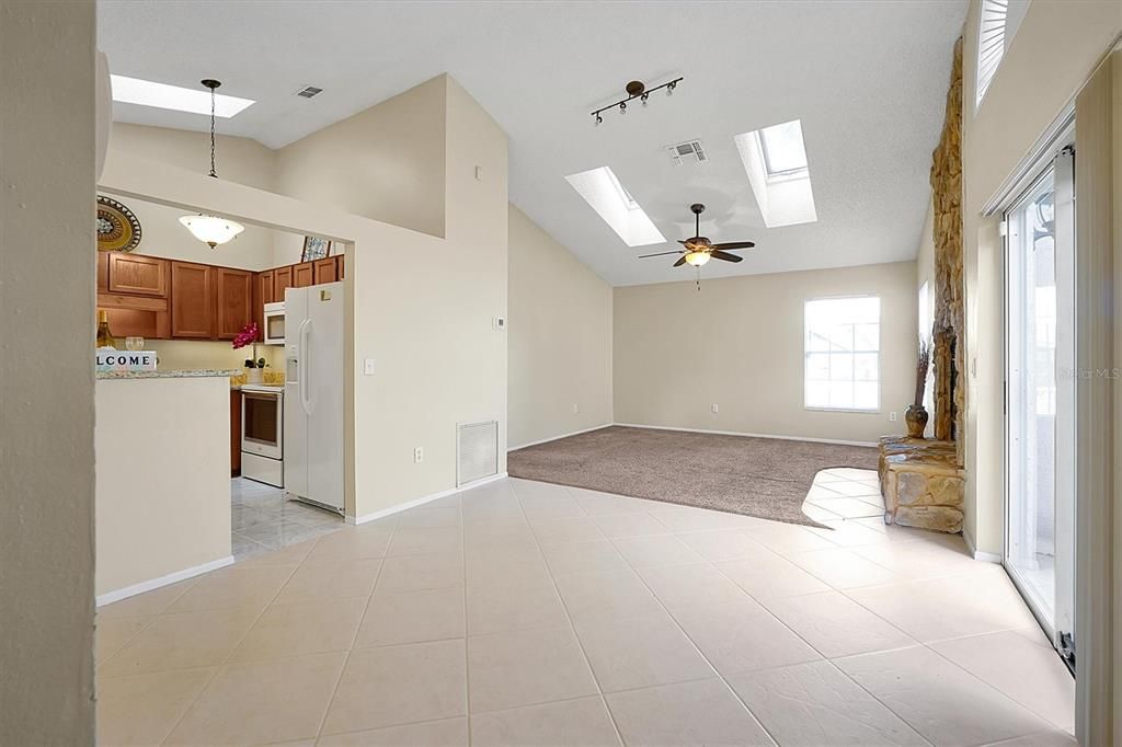 View from foyer to living room and kitchen