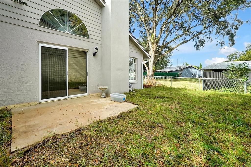 Fence in yard with patio