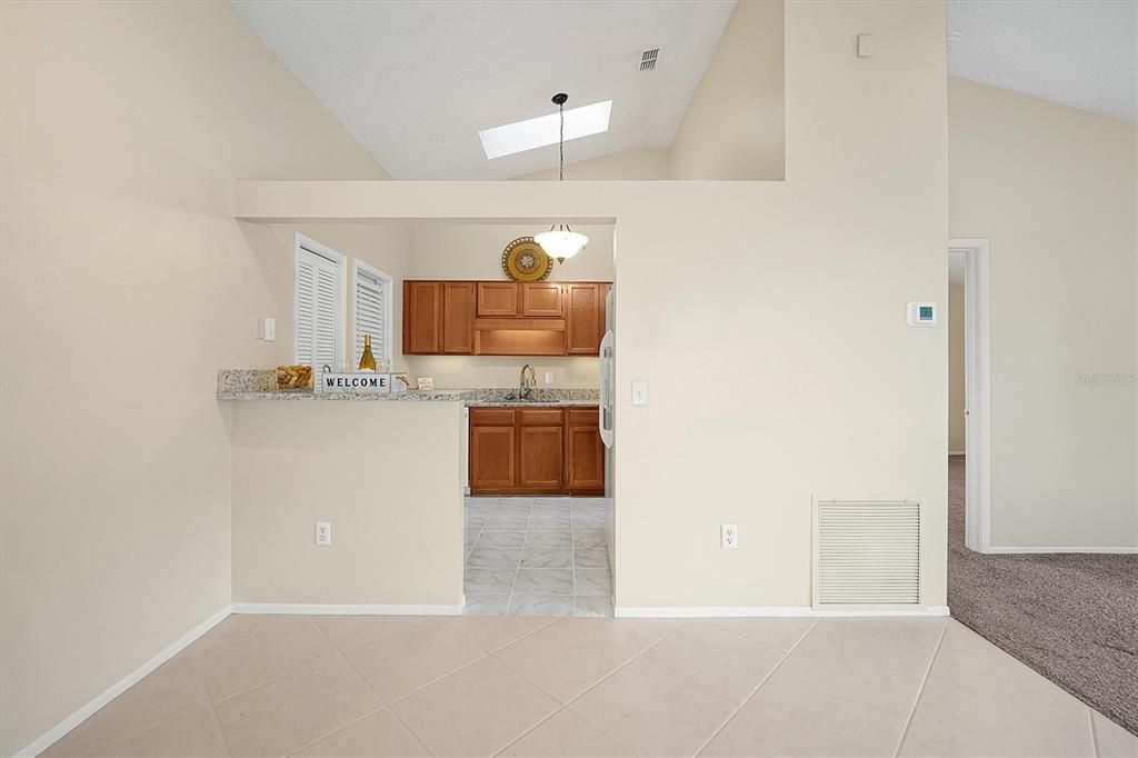 Dining area view into kitchen