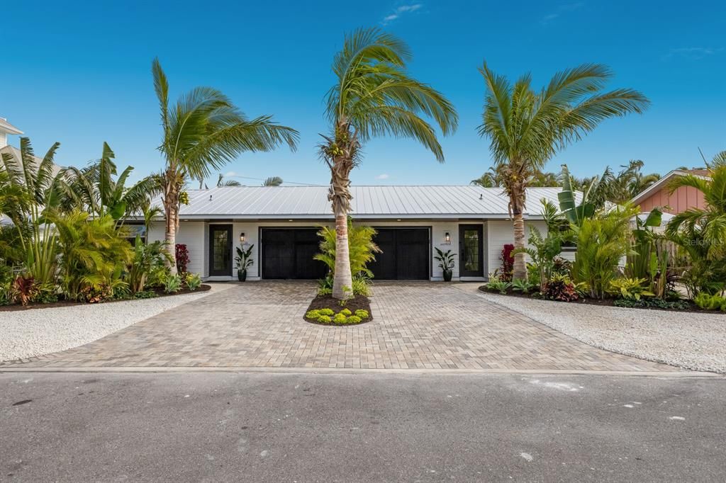 Brand new paved driveways and Brand new metal roof