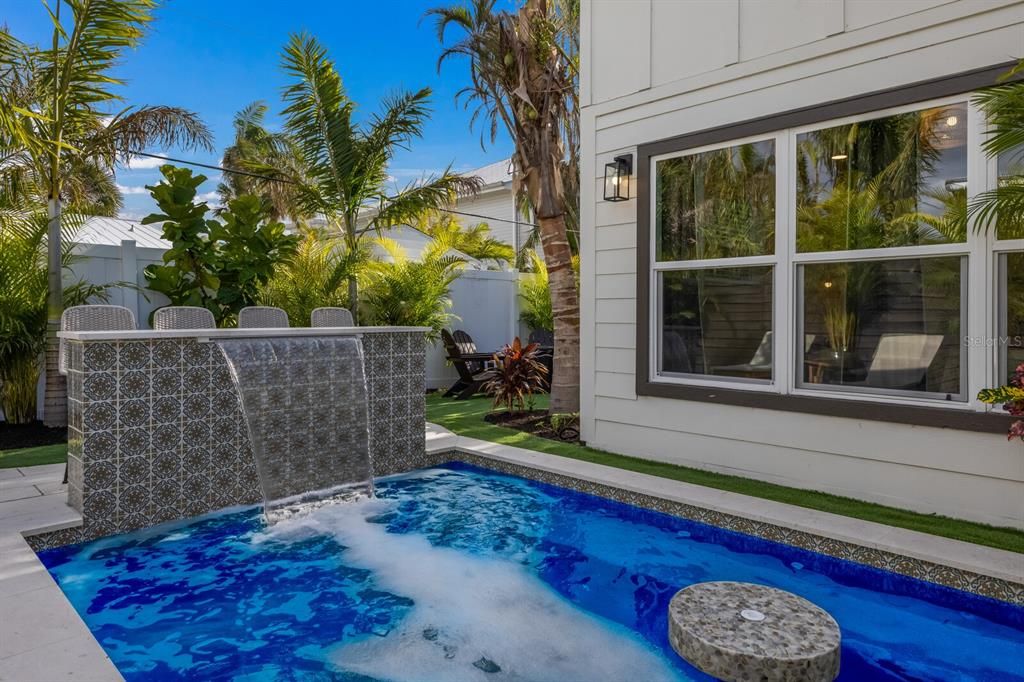 Water feature in the heated pool like no other!  What a way to relax