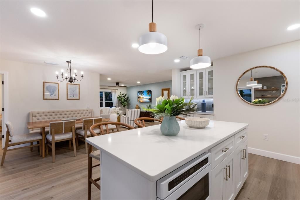 Kitchen island with Pompell Quartz Maximus counters!  Cafe appliance built in microwave