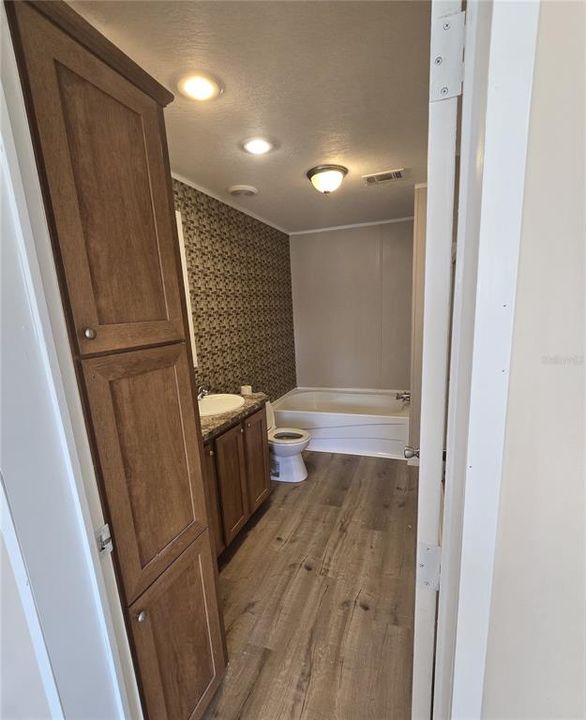 There is a also a linen closet in the primary bath for additional storage.