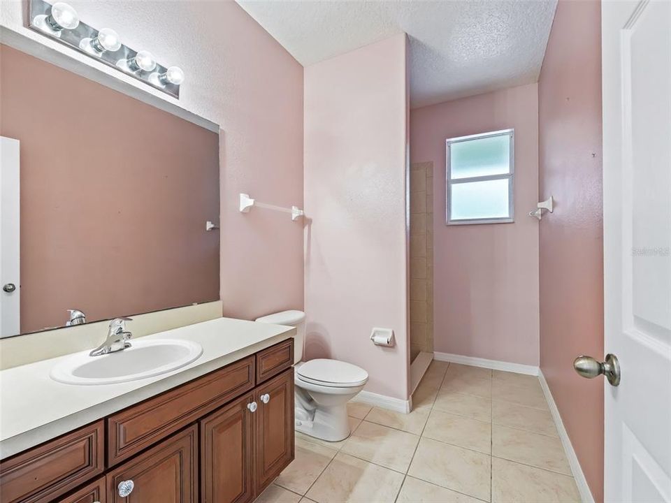 GUEST BATH IN REAR WITH WALK IN SHOWER