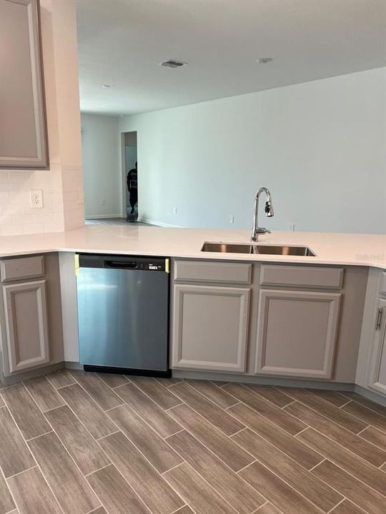 Kitchen with view of the livingroom.