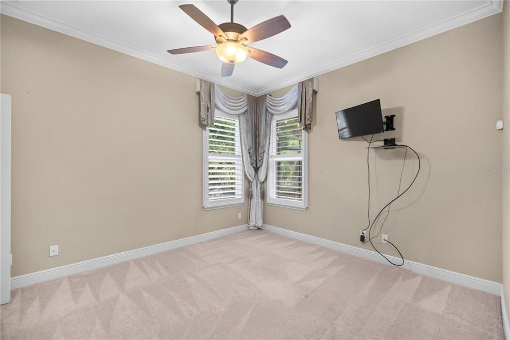 Guest bedroom 2 with Custom Cornice boards & Plantation Shutters