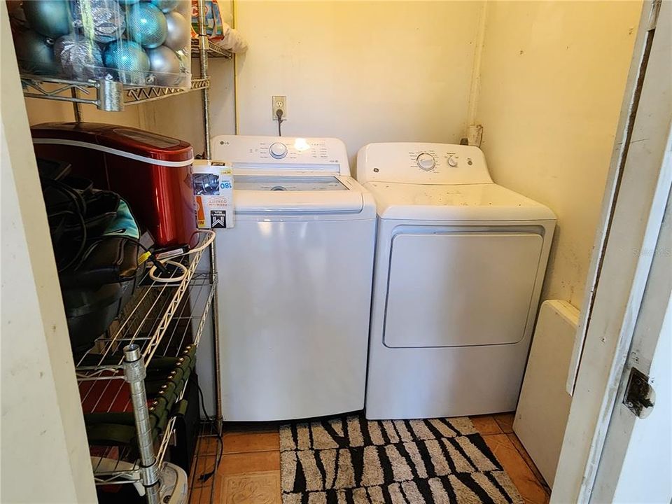 Laundry closet off 1st floor balcony