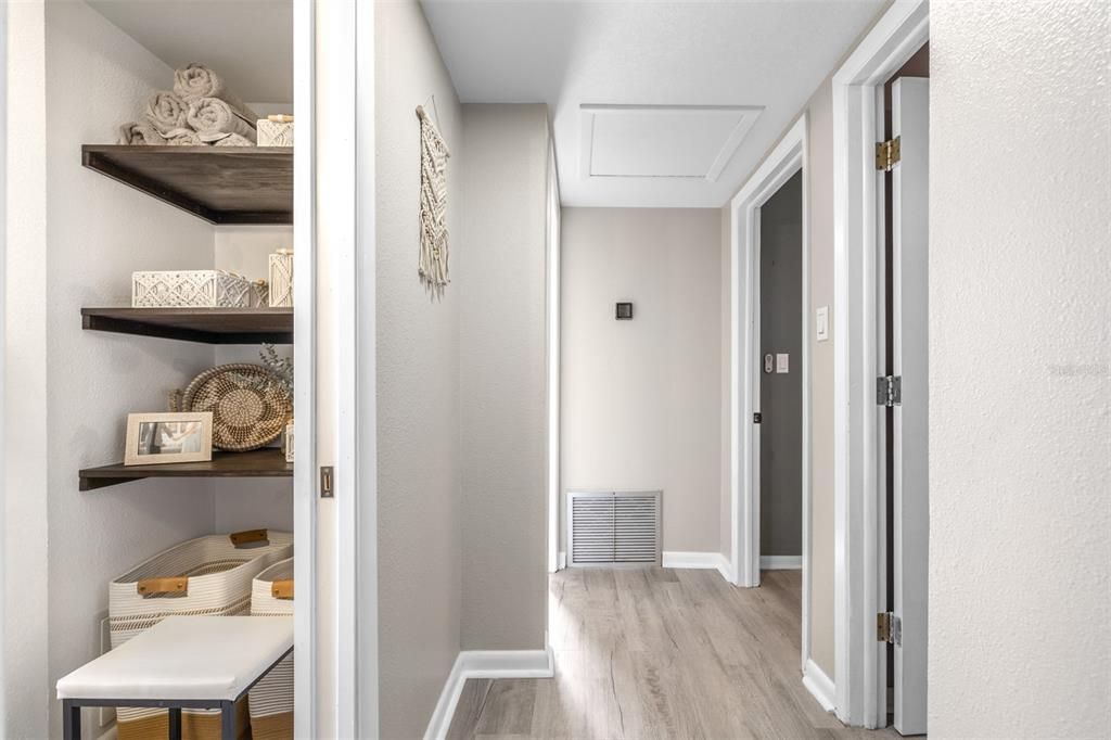 storage shelves in bathroom