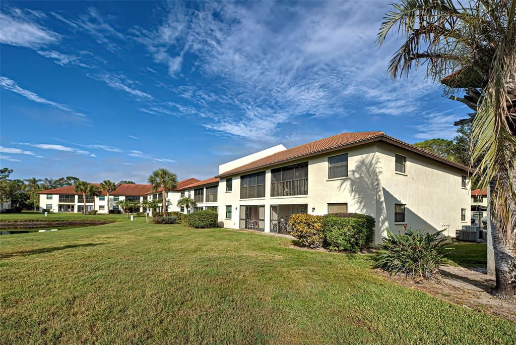 End Unit - Upper Floor with screened -in balcony.