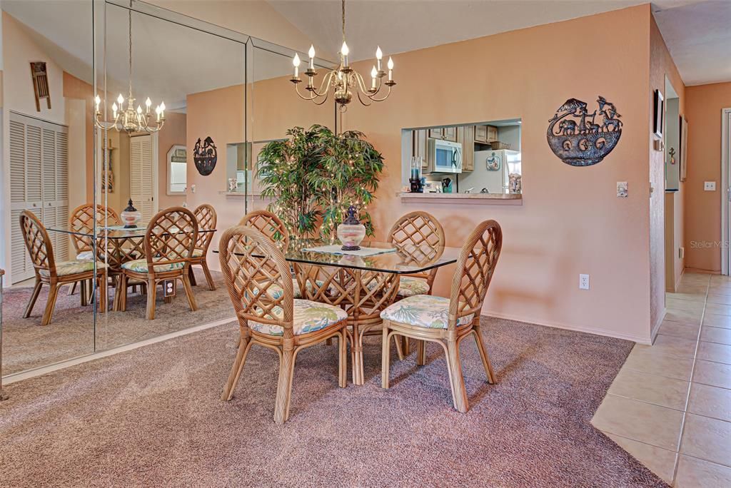 Dining Area with kitchen passthrough.