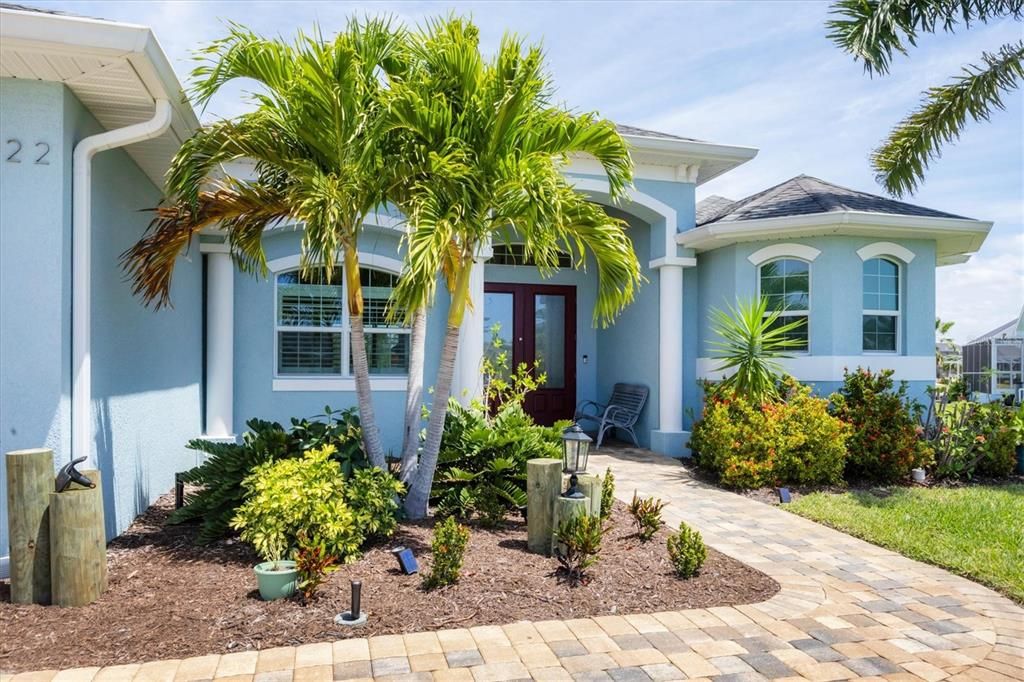 Stunning Curb Appeal with a Paver Walkway and Mature Landscaping