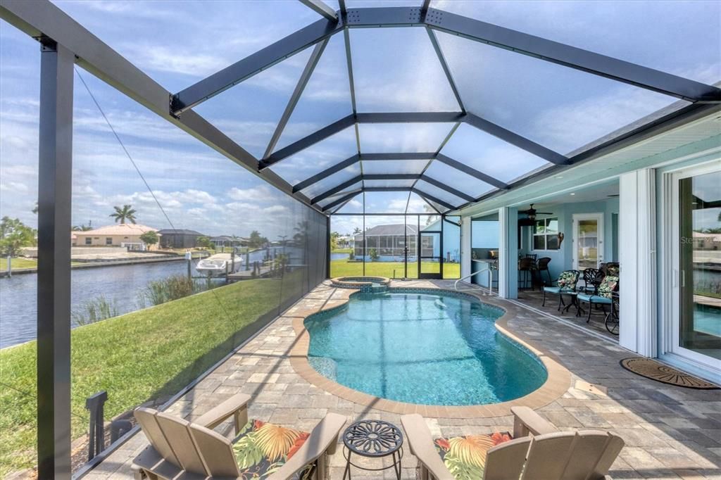 Expansive Paver Pool Deck for Sunbathing