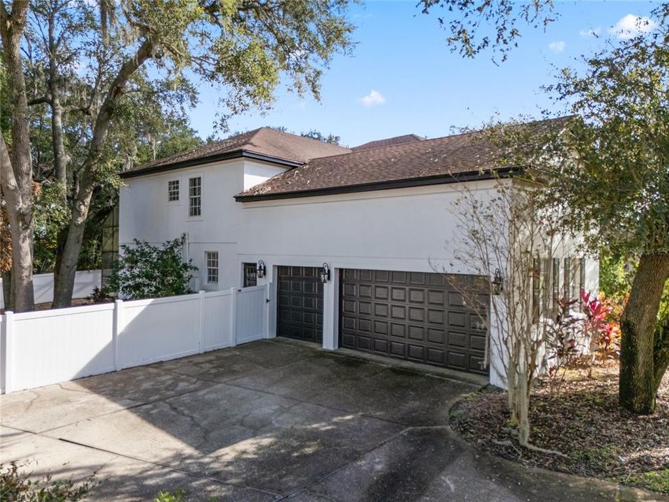 Triple garage to the side of the property