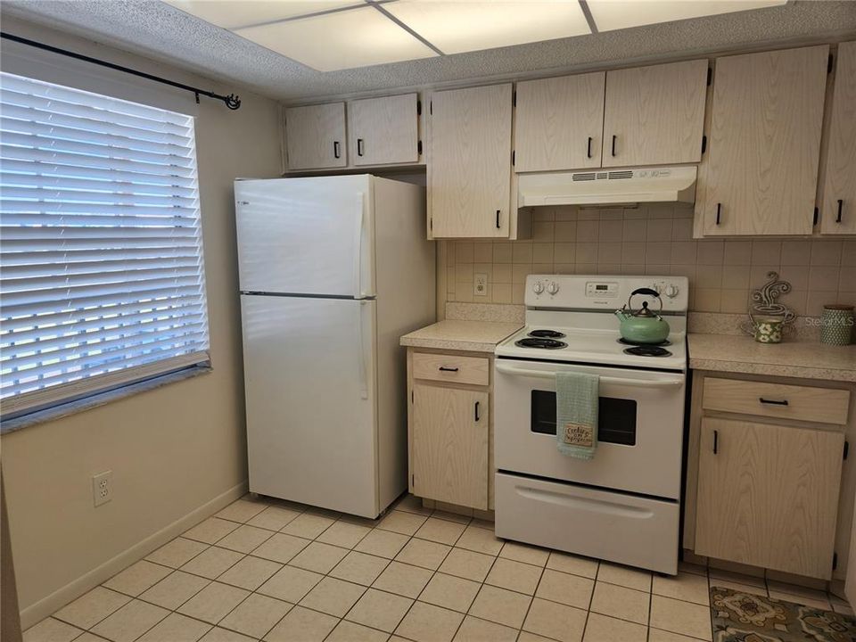 Eat-in kitchen with window. Plenty of room for a cafe table.