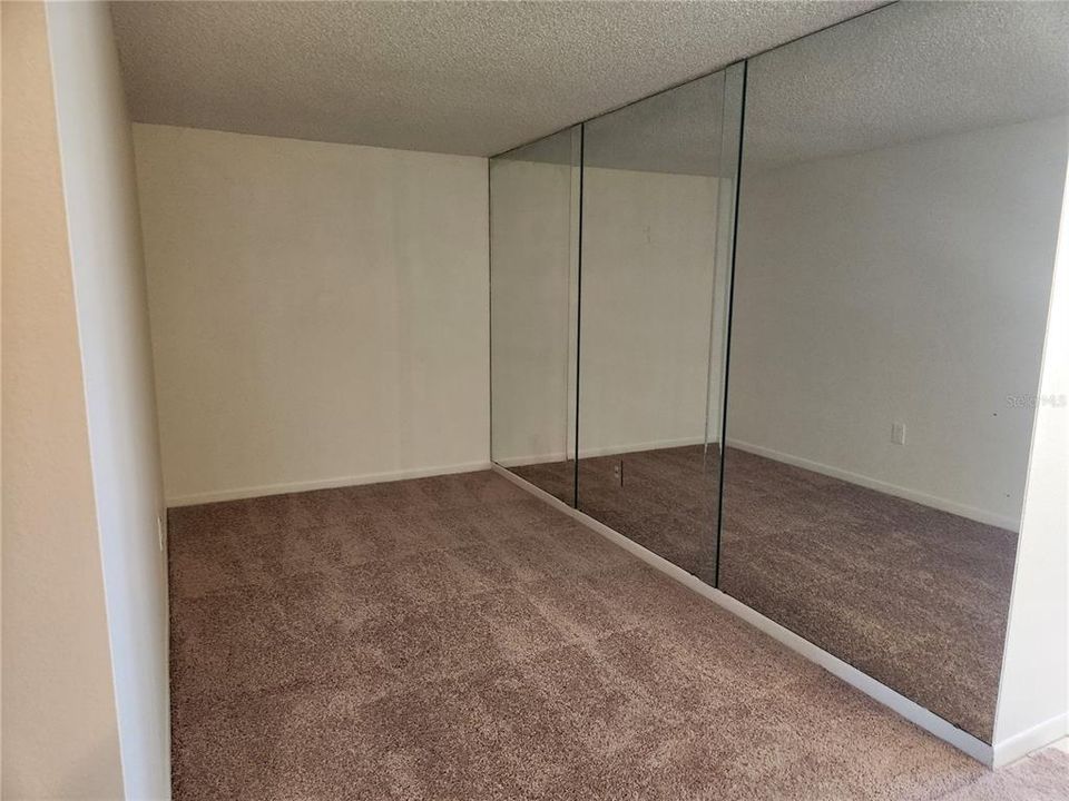 Bonus room with mirrored wall can be a great workout area !