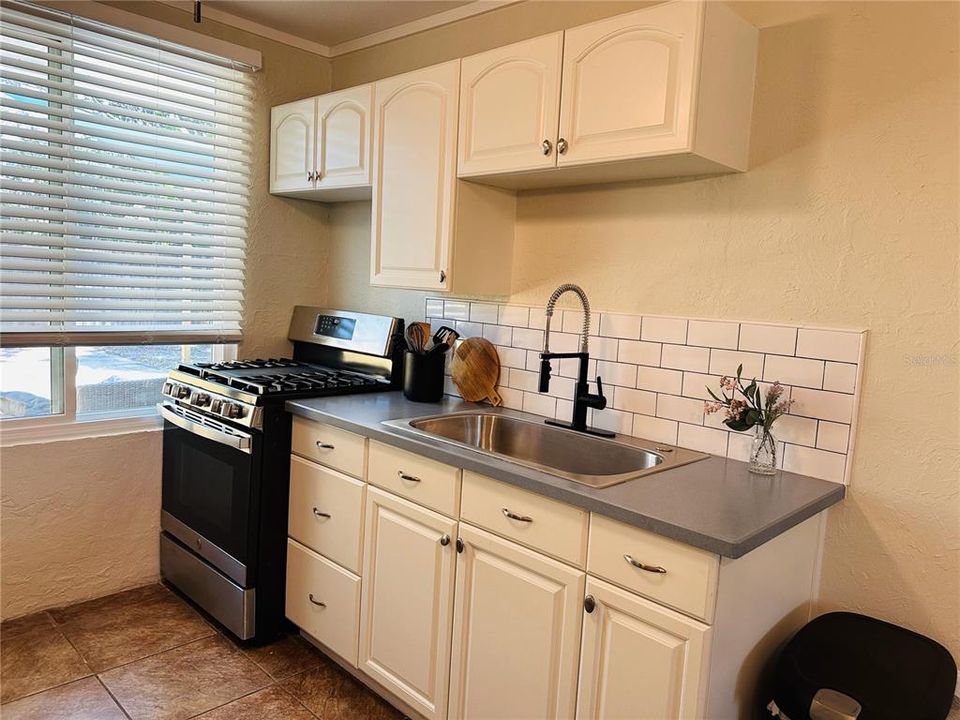 Smaller unit stainless appliances.