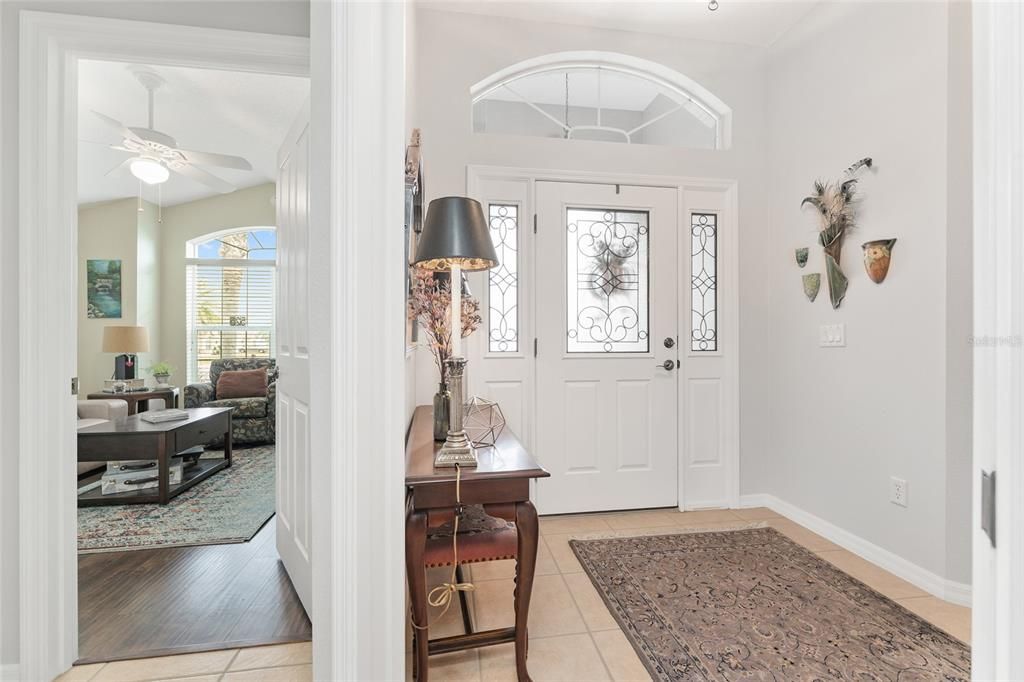 View from front HALLWAY - Entrance of BEDROOM #2 (L) and angled FOYER (R)