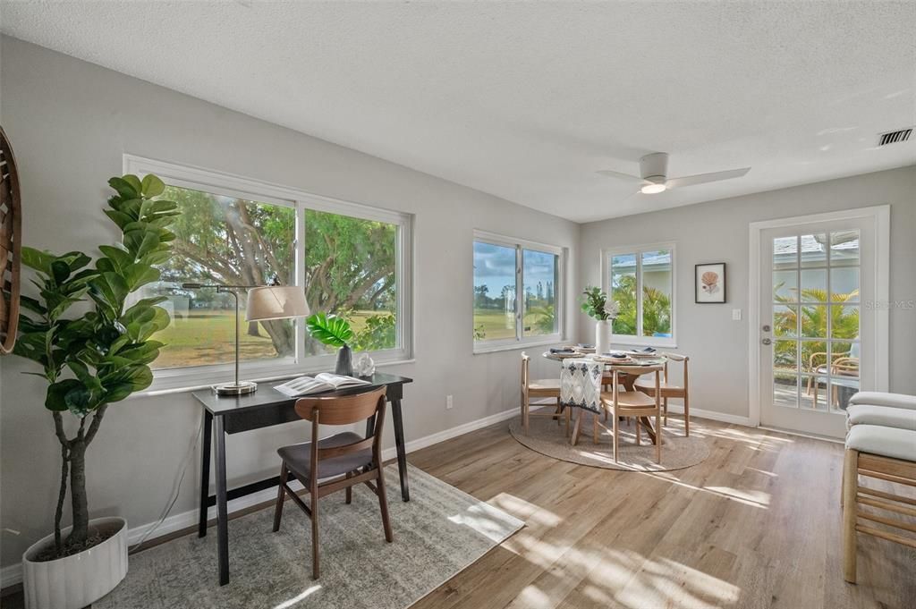 family room with golf course