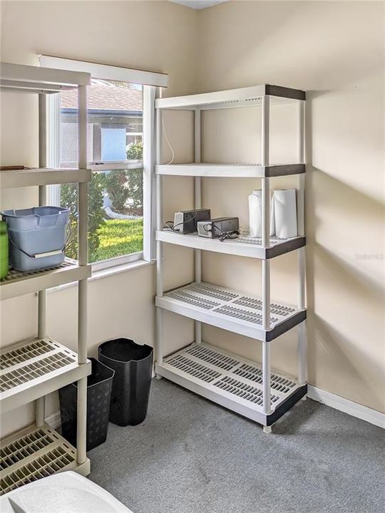 Laundry-Utility Room with plenty of storage.