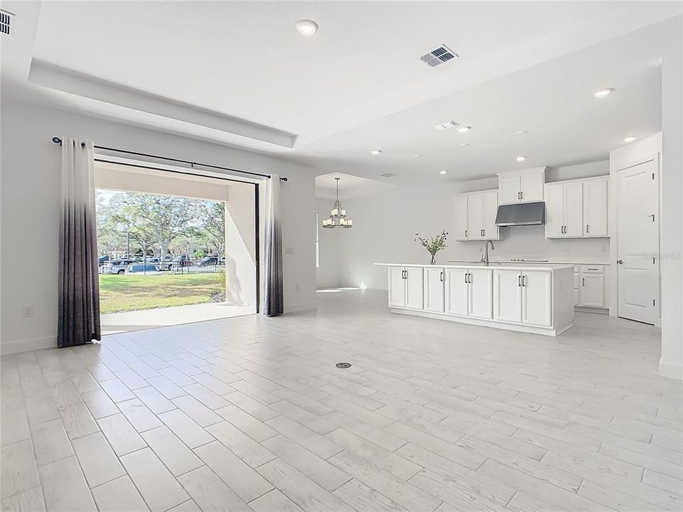 Great Room to Lanai with Pocket Sliding Glass Doors.