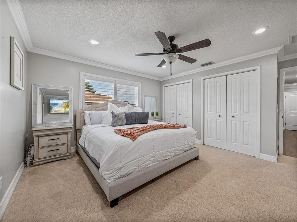 Primary bedroom with built in closets