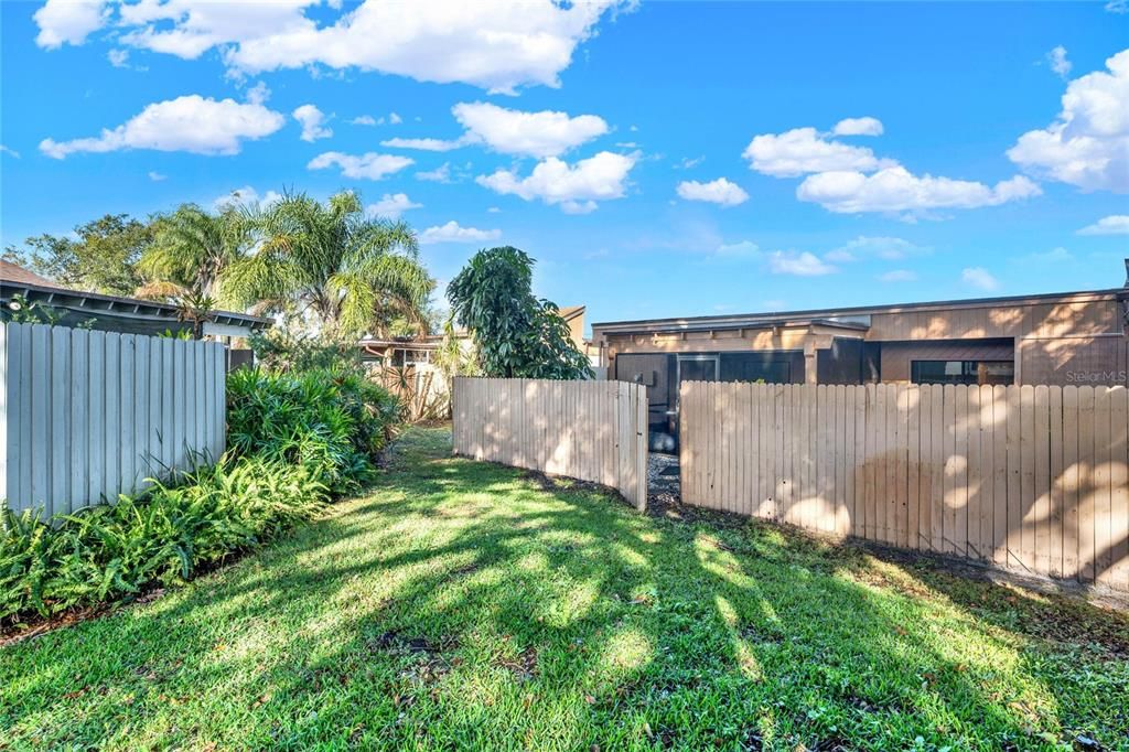 Backyard gate leads to open area