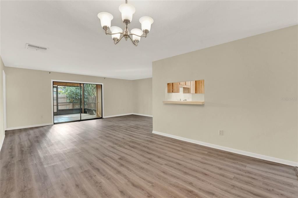 Dining/family room. Kitchen has pass-through window.