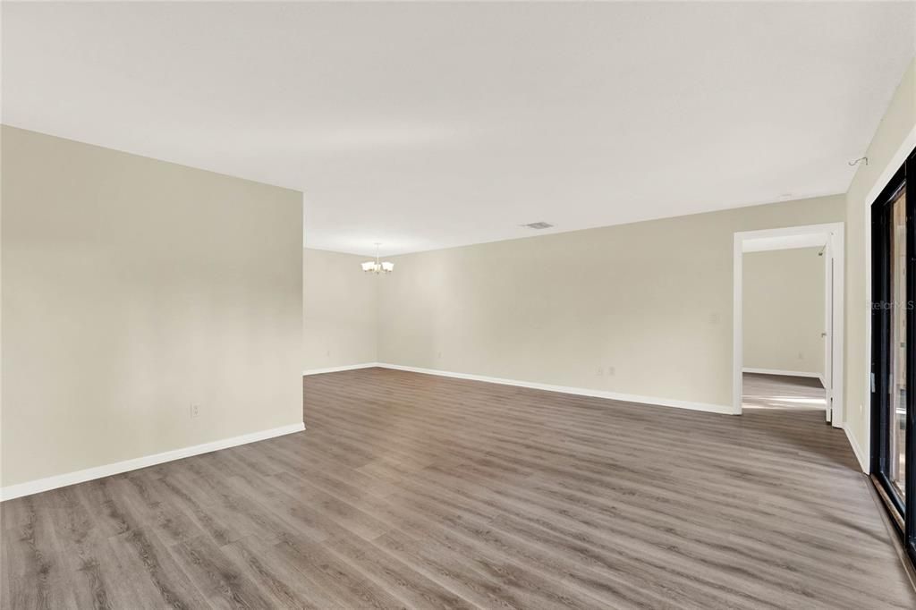 Family/dining area.  Door leads to primary bedroom.