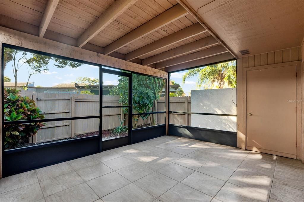 Rear patio features storage closet