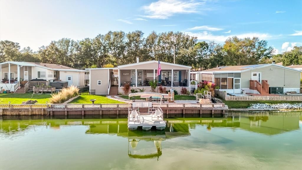 Eye Level  View of subject home from out in the Lake