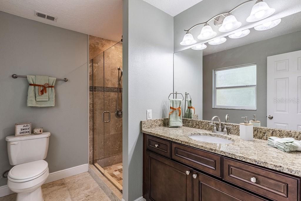 Master Bath with Granite and Tile Shower