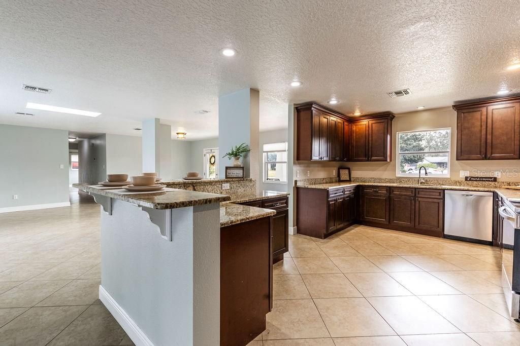 Bar Seating! Open Living Room to Chefs Kitchen.... no lack of counter or cabinet space!