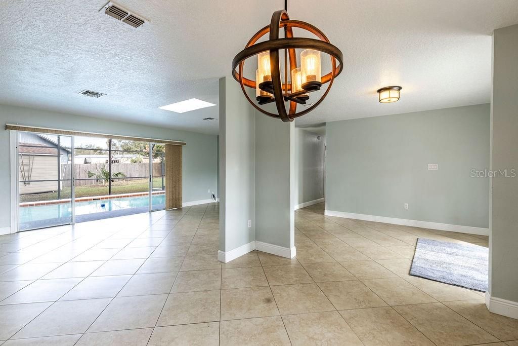 Enter into a warm, bright open space! Living Room, Dining Area, Pool Table, whatever your heart desires!