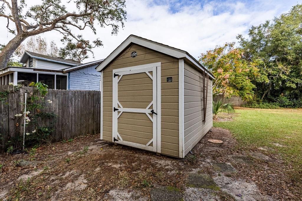 Shed for all your gardening and outdoor stuff! Volley ball net, play set, use your imagination on this lot. No HOA!