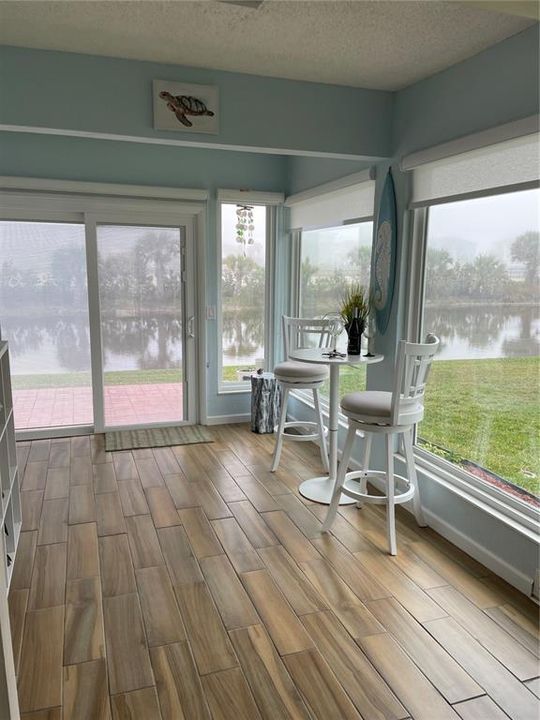 Florida room w/view of canal and park