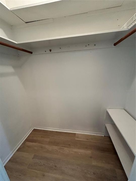 walk in closet in the main bedroom