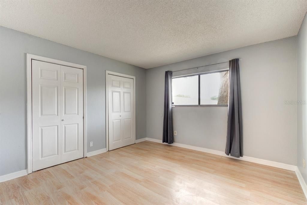 Primary bedroom.  His and Her Closets.