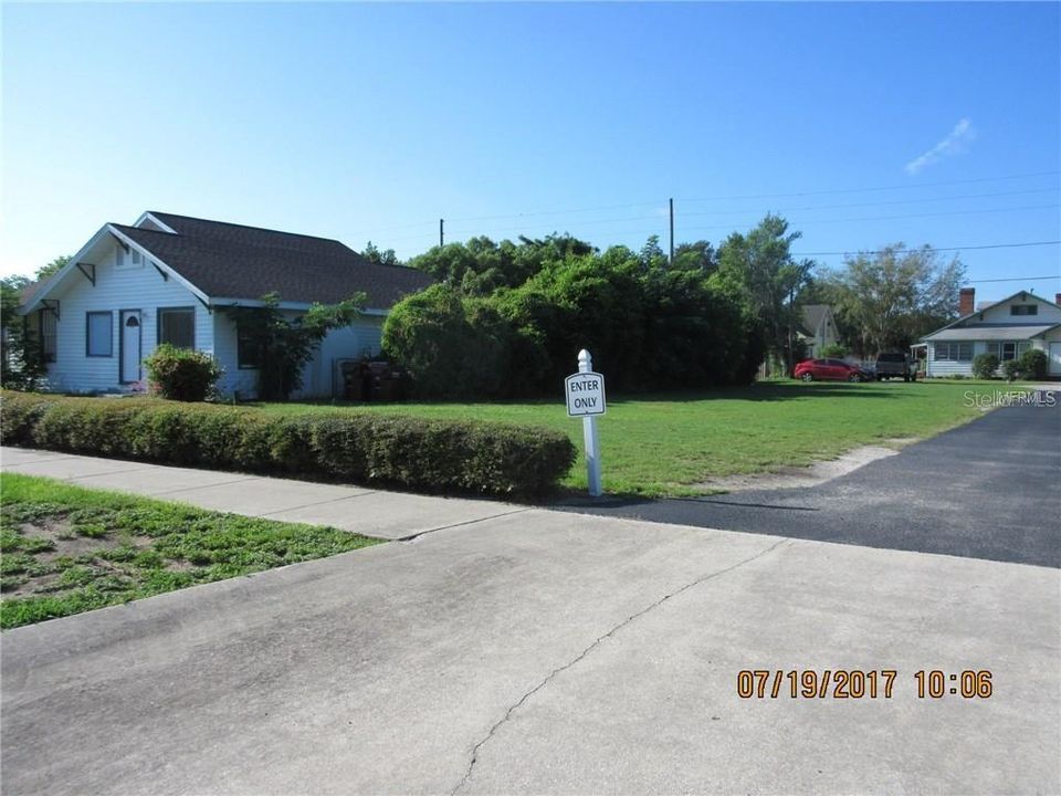 FRONT OF ADJACENT HOME ON PROPERTY