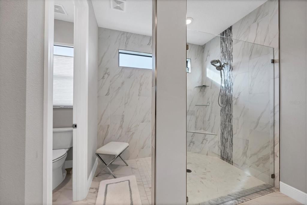 Expansive master bath with upgraded shower bath package and tiling