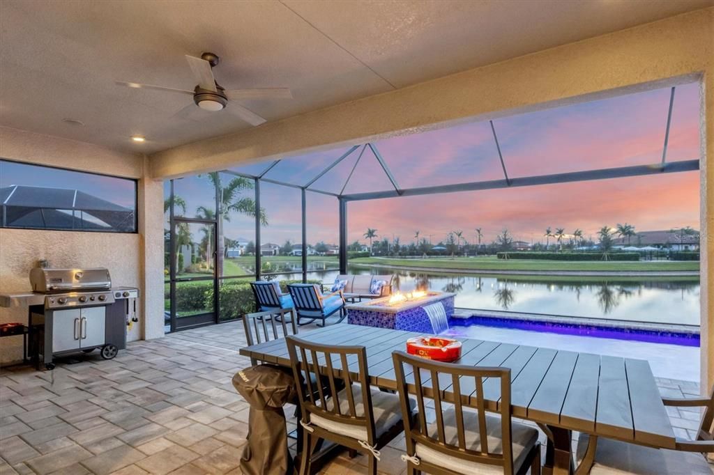 The thoughtful owners added a privacy wall and rough ins for an outdoor kitchen.