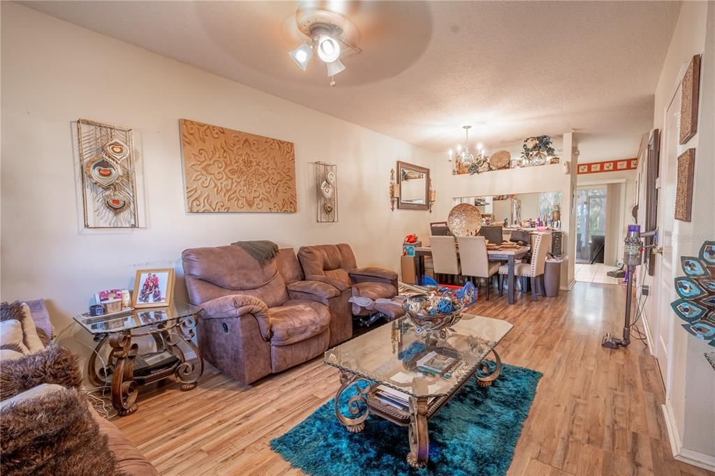 Living room is open to the dining room and kitchen.