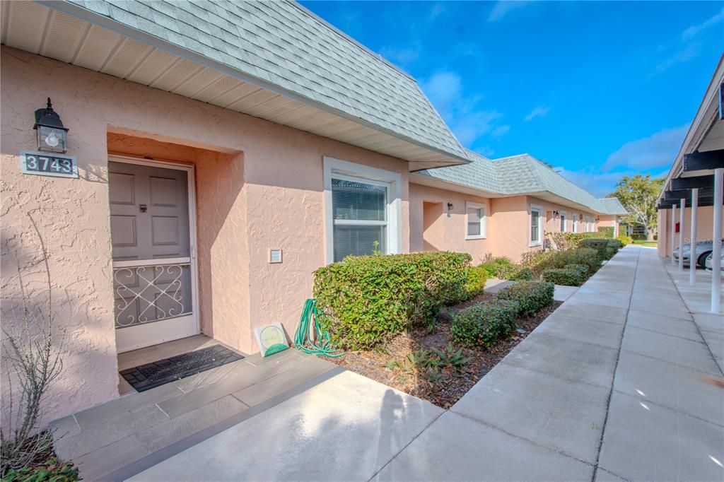 Front entry with screen door.