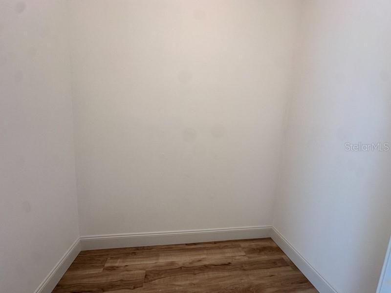 large walk in closet in Primary bedroom