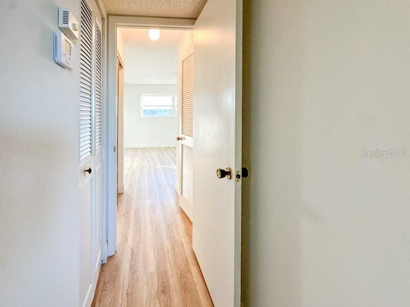 hallway leading to primary bedroom