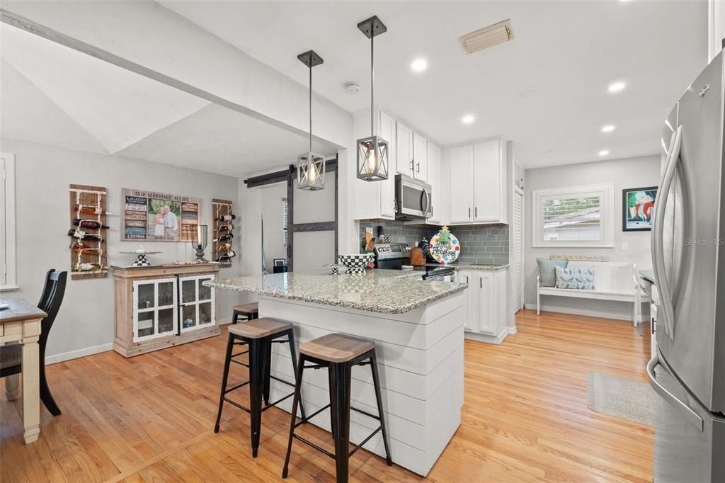 Beautifully updated kitchen with breakfast bar.